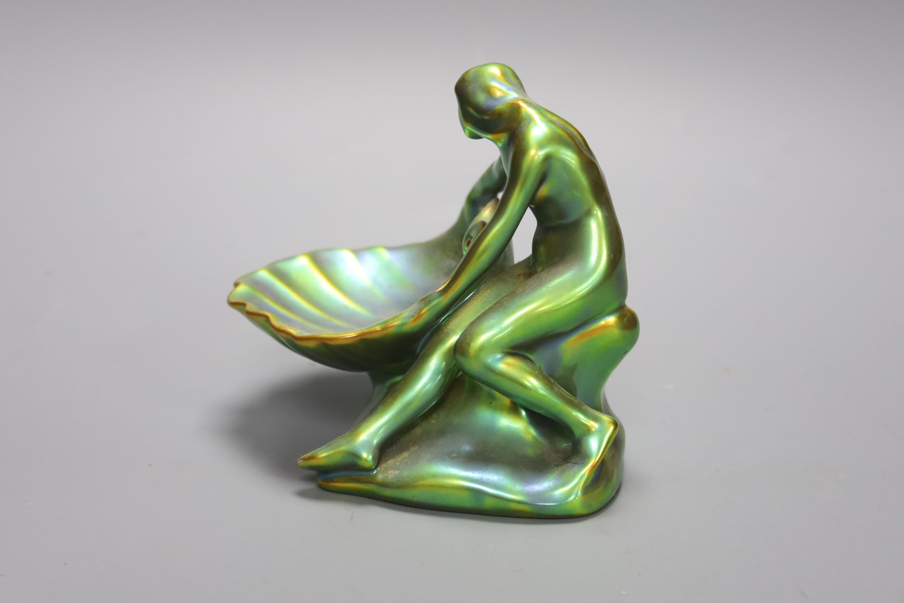 A Zsolnay eosin figural dish, height 12cm